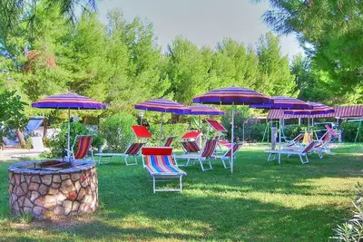 Image de Casa Vea C: Un appartement confortable situé à une courte distance de la plage.