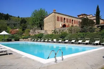 Image de Borgo Bello F: Un appartement romantique et confortable dans le style caractéristique de la campagne toscane.