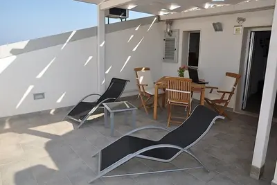 Image de Appartement Odisseo C: Un appartement agréable situé à quelques pas de la plage de sable.
