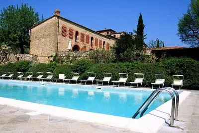 Image de Borgo Bello L: Un appartement caractéristique et accueillant dans le style caractéristique de la campagne toscane.