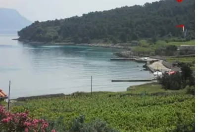 Image de Appartement dans Lumbarda avec vue mer, terrasse, Climatisation, Machine à laver (876-2)