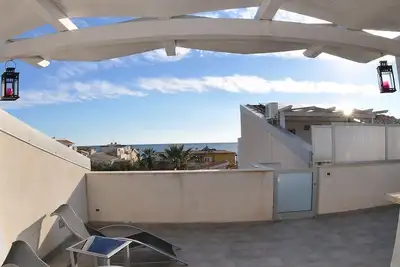 Image de Appartement Odisseo B: Un appartement agréable situé à quelques pas de la plage de sable.