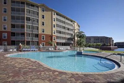 Image de Condo pour familles avec piscines, complexe hôtelier, navette pour parc à thème et WiFi