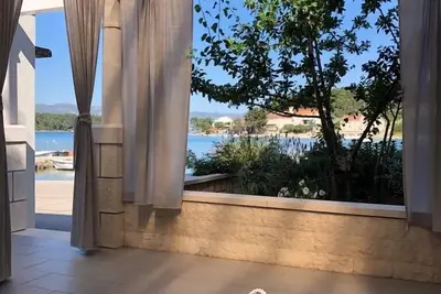 Image de Appartement Studio dans Lumbarda avec vue mer, terrasse, Climatisation, Wifi (128-3)