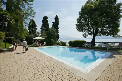 Image de Spacieux appartement de 2 chambres avec deux balcons, piscine et accès au lac