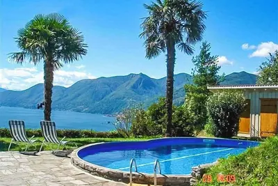 Image de Maison individuelle 4 ½ pièces avec piscine et une vue imprenable sur le lac