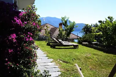 3 ½ pièces avec deux terrasses, jardin et une vue magnifique sur le lac