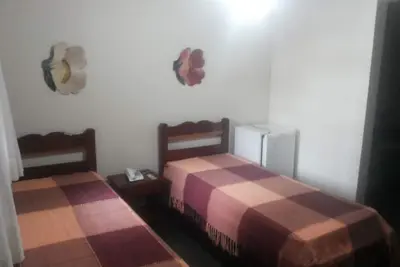 Image de Pousada confortable Ă Pendotiba - Chambre pour 04 personnes