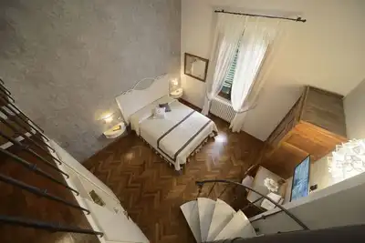 Image de Superior Settimo Cielo with A/C and Private Bathroom in Villa le Facezie B&B