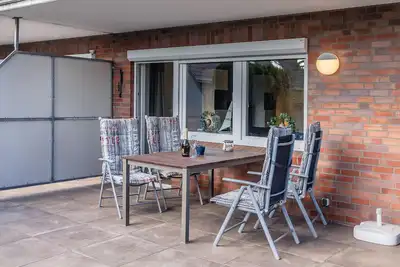 Image de Complètement sur Bquemlichkeit out: L'appartement rez de chaussée avec son ca.