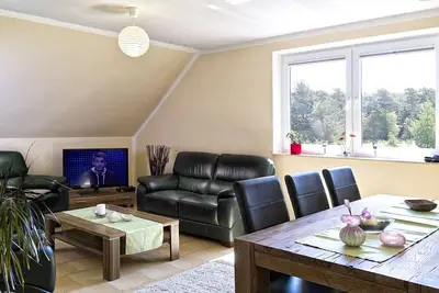Image de Appartement confortable, dans un endroit calme en forêt, à quelques minutes en voiture. à la plage