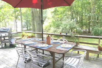 Image de Maison familiale près de la plage avec une magnifique terrasse! Moments de la plage.