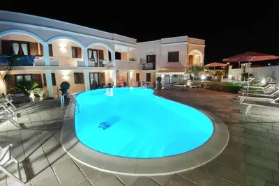 Image de Chambre d'hôtes Vignali Family room 2 with pool view