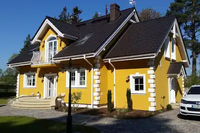 Image de Petite villa jaune à Mazurie (appartement Ost dans les combles)