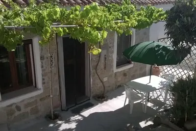 Image de Appartement \"Terra\" de deux pièces, dans le golfe d'Orosei, dans une maison typique sarde avec jardin