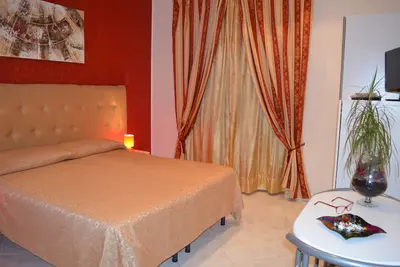 Image de Au 1er étage, la chambre du B & B est équipée d'une télévision à écran plat, cassafor