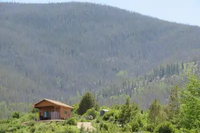 Image de Factures<br>Mountain Cabin est un séjour écologique dans une cabane en rondins!