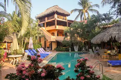Image de Appartement spacieux, vue sur le jardin, piscine sans chlore, à 1 minute de la plage