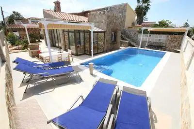 Image de Finca Sonnenschein, villa de haute qualité en pierre naturelle au bord de la mer