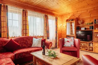 Image de maison en bois confortable d'environ 70 m² avec jardin clôturé - chiens willk - Wlan incl