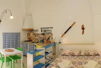 Image de Sirocco Lodge pour 2 p avec cuisine, dans Masseria avec piscine partagée dans le Salento