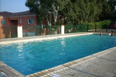 Image de 2 Rooms Air-Conditioned Wifi  With Swimming Pool Close To Shops And Beaches