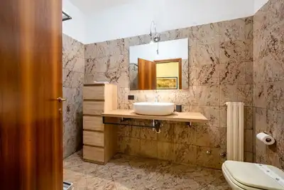 Image de Dimora Scrimiari-Confortable et agréable appartement indépendant avec 2/3 couchages.