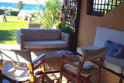 Image de Détendez-vous dans la verdure - Golfo di Marinella apt. véranda, piscine, plages gratuites, parking