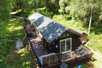 Image de Berneray est une charmante cabane dans un cadre magnifique, au fond de la forĂŞt.