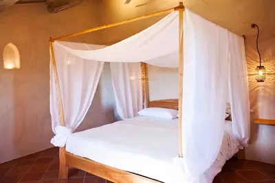 Image de Chambre suite dans ferme avec piscine en pleine nature
