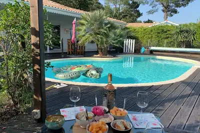 Image de Petit coin de paradis avec piscine chauffée et jaccuzi