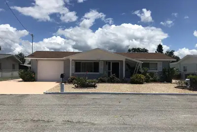 Image de Maison front de mer avec accès direct au golfe et piscine couverte avec lanai et bain à remous
