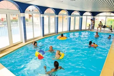 Image de F2  4 pers avec 2 piscines 300 m plage Cabourg Résidence 3 * parking privé