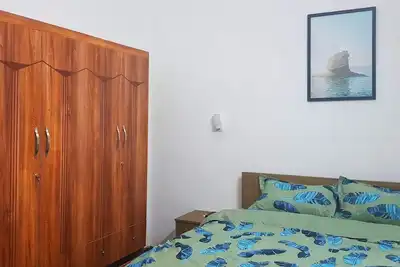 Image de Chambre confortable avec lit queen et balcon dans la famille d'accueil Linterna