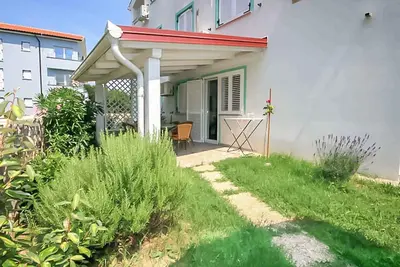 Image de Appartement de vacances avec jardin et barbecue