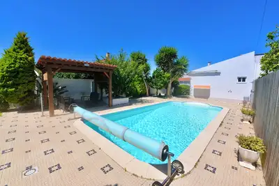 Image de Laranjeira - Maison avec jardin et piscine privée, parking et WiFi