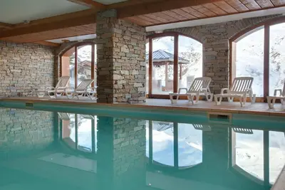 Image de Wifi, pied des pistes de ski, remise en forme, piscine, sauna, hammam, balcon, parking, télévision