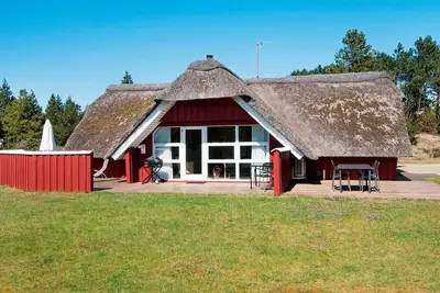 Image de Maison de vacances pour 8 a Rømø-By Traum