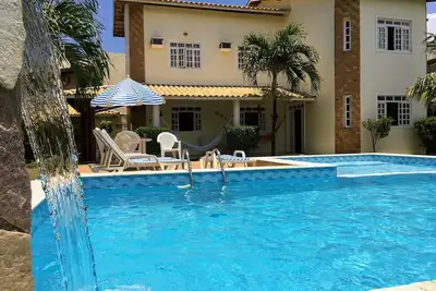 Image de Belle maison! Piscine, plage, jardin dans une communauté fermée!