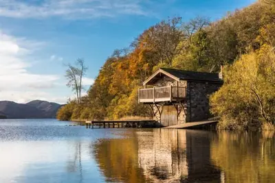 Image de Boathouse de luxe peut accueillir 2 personnes dans 1 chambre avec vue sur le lac