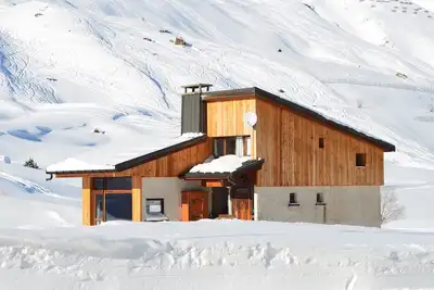 Image de Tignes Val Claret Chalet Ski et Eté pour 4 chambres 8/9 avec cheminée