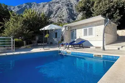 Image de Le Cottage Girani avec piscine