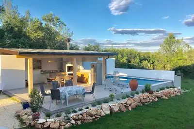 Image de Nouveau! ! Maison de vacances avec piscine et cuisine d'été, à seulement 5 min. de la plage