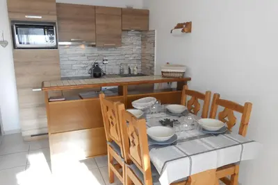Image de Appartement cozy au pied des pistes avec balcon, parking, et animaux admis