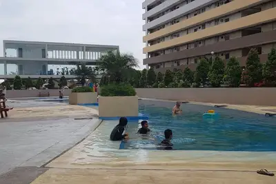 Image de Saekyung Condo près des plages + Wifi + Netflix + Piscine + Gym