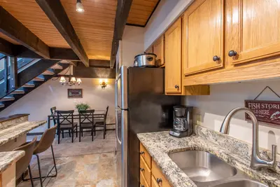 Image de Condo ski-in / walk-out, bain à remous extérieur, wifi gratuit et parking