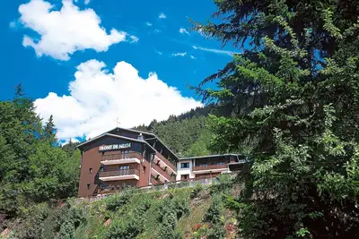 Image de Super endroit! Appartement cosy au pied des pistes, local Ă skis sur place