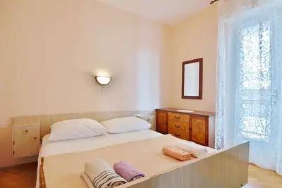 Image de Appartement de deux chambres avec la terrasse Palit, Rab (A-17881-b)