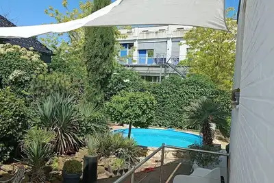 Image de 100 m2 appartement / bungalow / 2 terrasses / jardin de palmiers et piscine