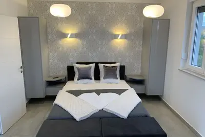 Image de Appartement «Laudato Xxl Deluxe» avec Jacuzzi et vélos gratuits